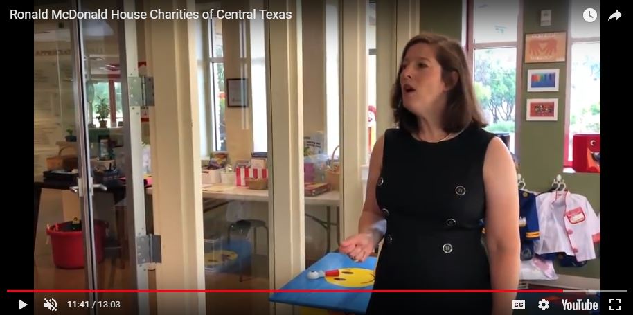 Video still of Carolyn Schwarz giving tour of the Ronald McDonald House for Katy Sokolic