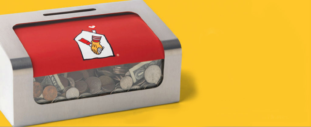 mcdonalds donation box filled with coins and donations for RMHC of central texas